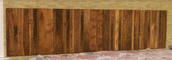 Walnut headboard for king size water bed with varied width and thickness strips
